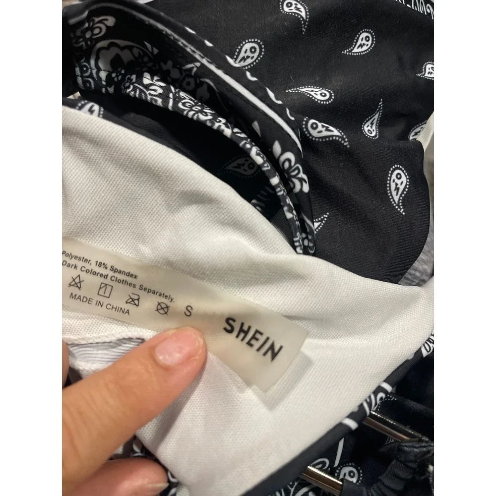 Black and white‎ suitcase, swimwear size small A-143